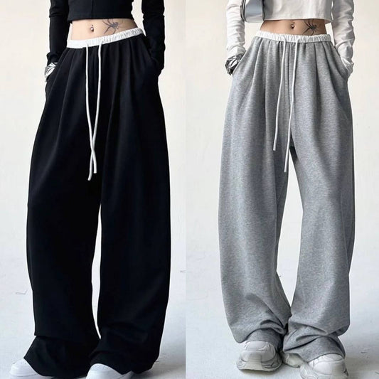 Pantalones básicos brillantes con cinturón blanco