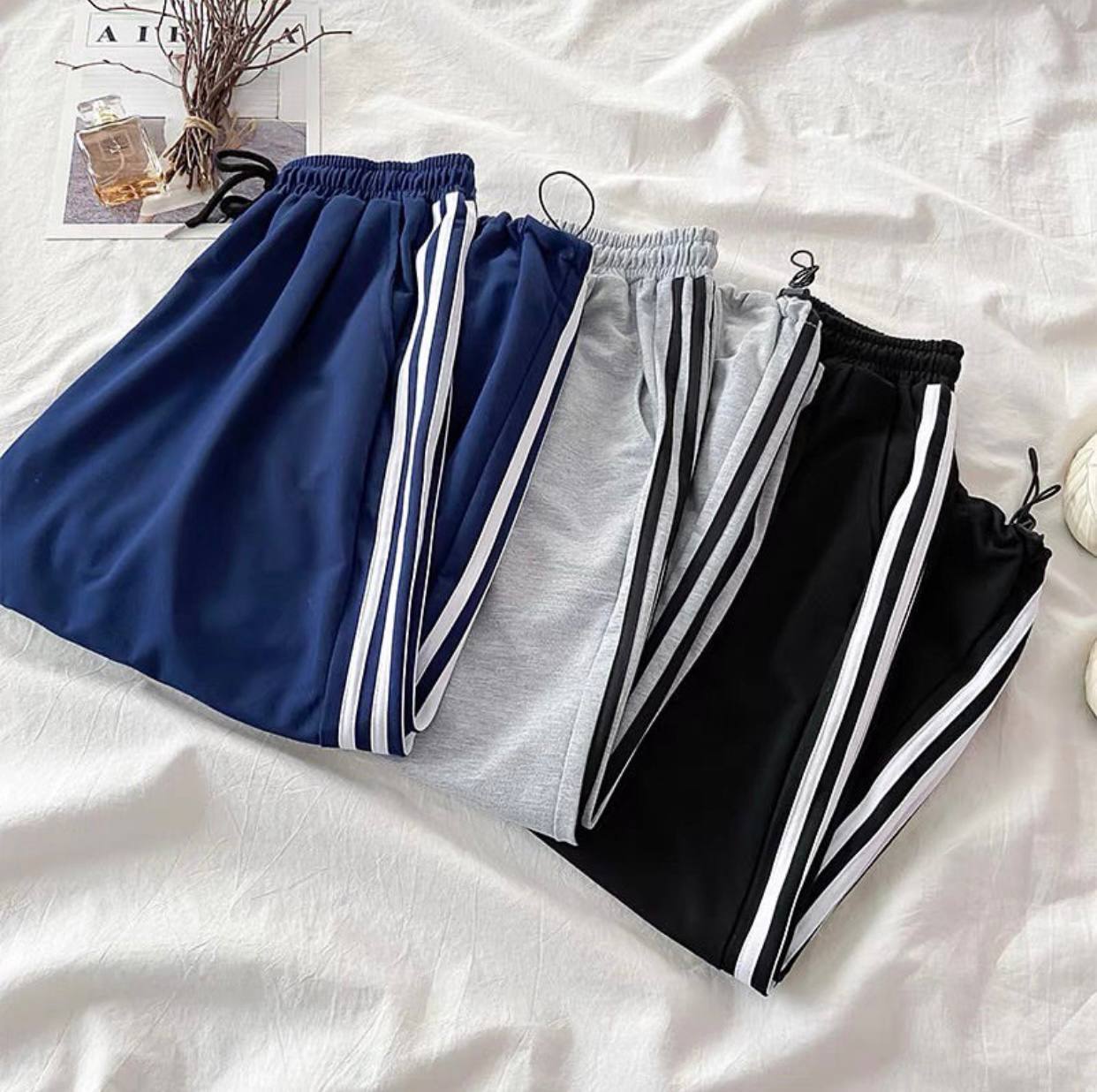 Pantalones básicos con franjas (no acolchados)