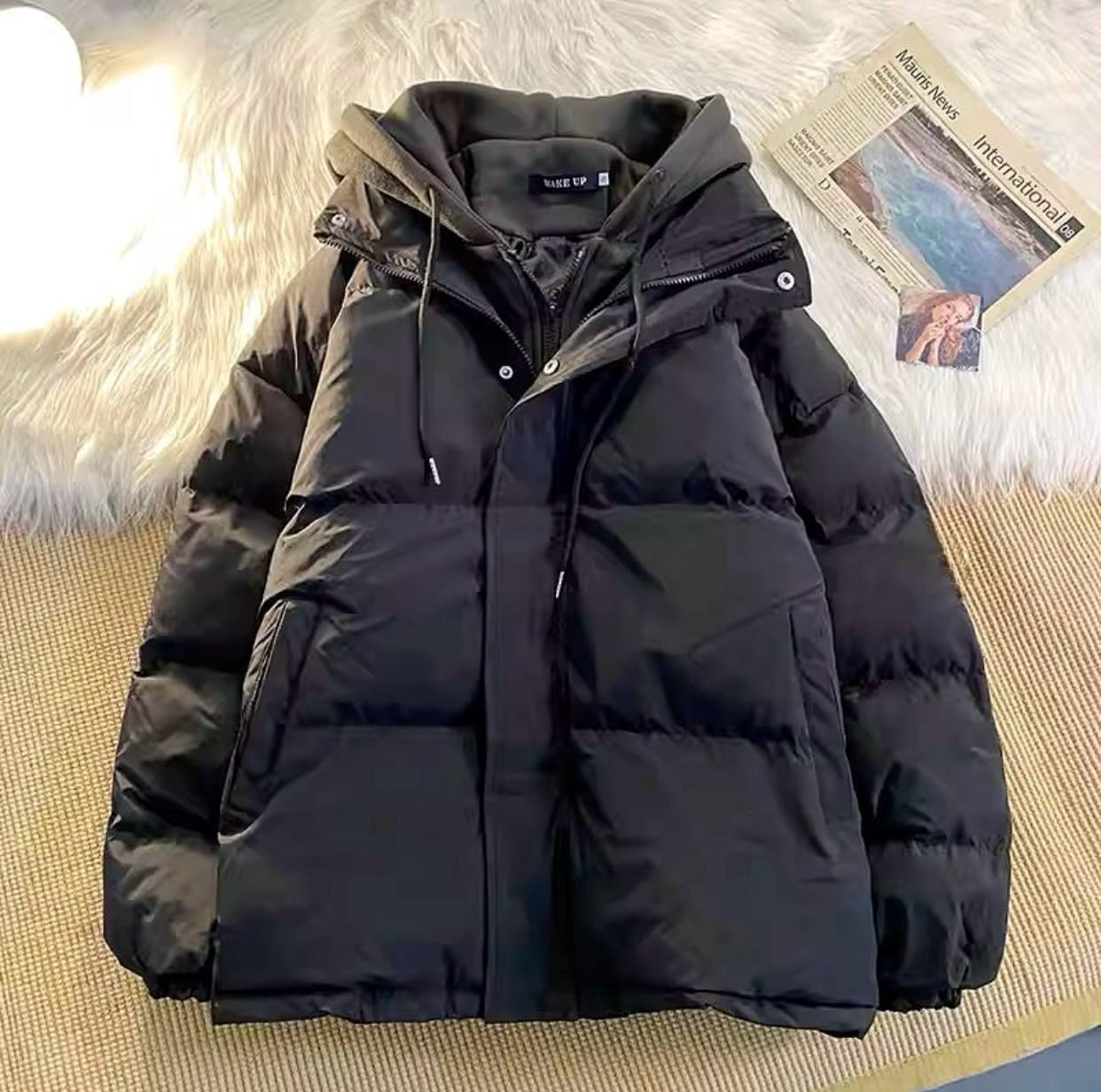 Chaqueta de plumas con capucha cosida